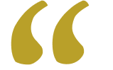 Gold quotation marks on a black background.